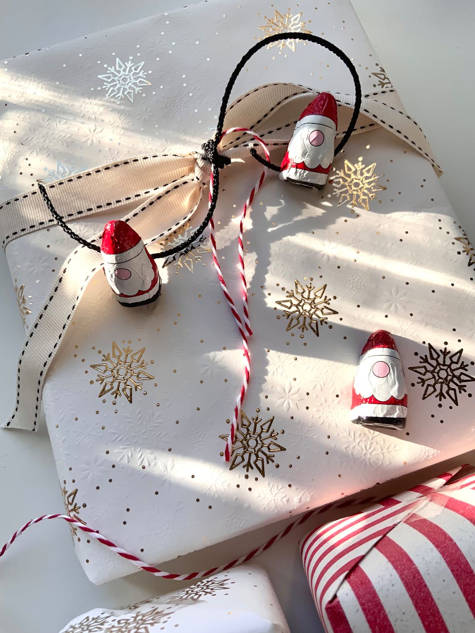 festive christmas gift wrap with gnome decorations